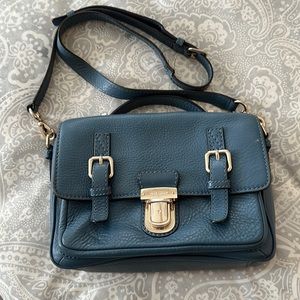 blue Kate Spade purse, used in good condition